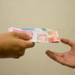 Foto: Ilustrasi pungli (Sumber: iStock)