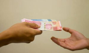 Foto: Ilustrasi pungli (Sumber: iStock) Foto: Ilustrasi pungli (Sumber: iStock)