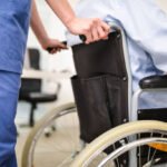 Nurse taking care of a patient on a wheelchair istockphoto 639637862 612x612 1 - Rembang