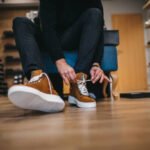 Young man shopping shoes istockphoto 1292261872 612x612 1 - Lifestyle