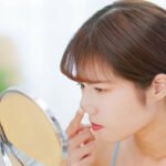 asian upset woman looking her bad unhealthy skin in mirror istockphoto 1737584598 612x612 1 - Lifestyle