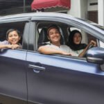Portrait Of Muslim Family Inside The Car Ready For Road Trip To Hometown istockphoto 2159121828 612x612 1 - Lifestyle